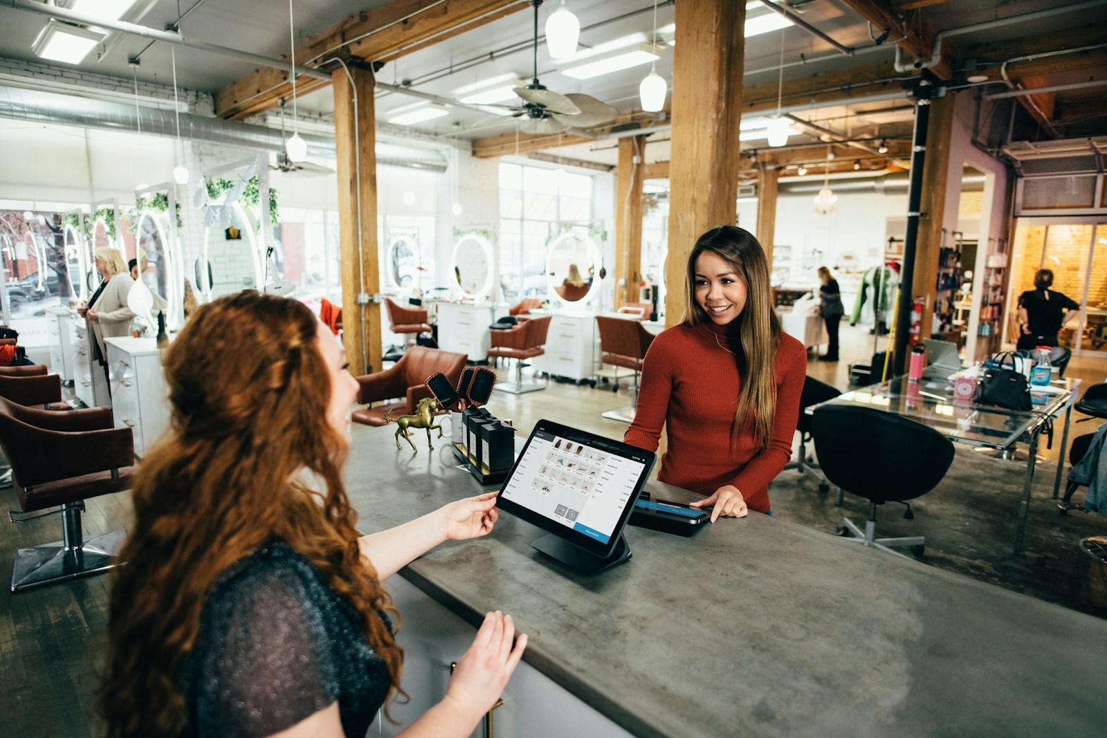 two women near tables, business